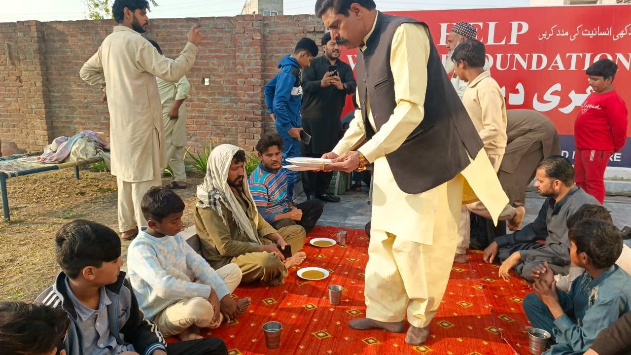 Help Welfare Foundation team visiting classroom and supporting underprivileged children during welfare and education activities in Pakistan